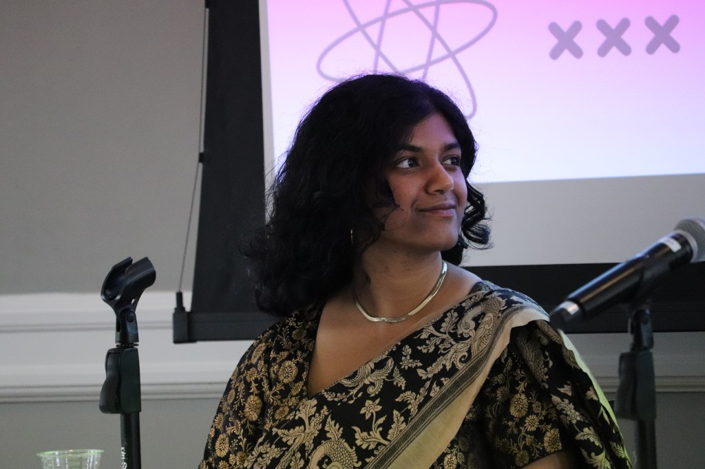 Avani Ghosh, looking to her left