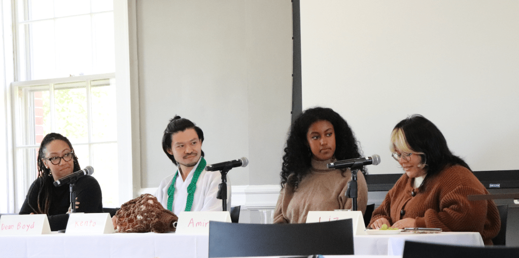 Dean Amari Boyd, Kento Suzuki, Amira Haileab and Elizabeth Flores seated at a long table.